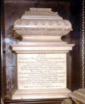 The urn in Westminster Abbey - an old stone urn in front of an ancient wall